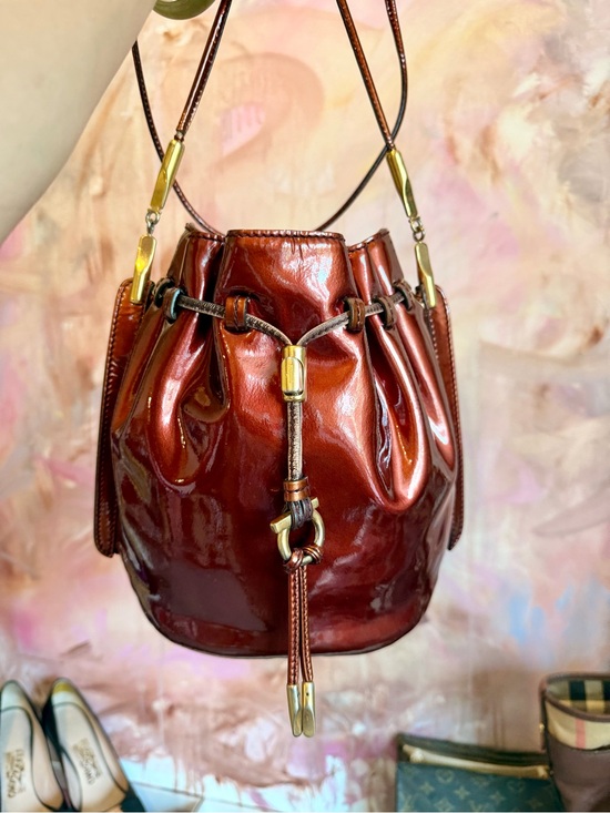 Salvatore Ferragamo Handbags - Salvatore Ferragamo Copper Leather Drawstring Bucket Bag